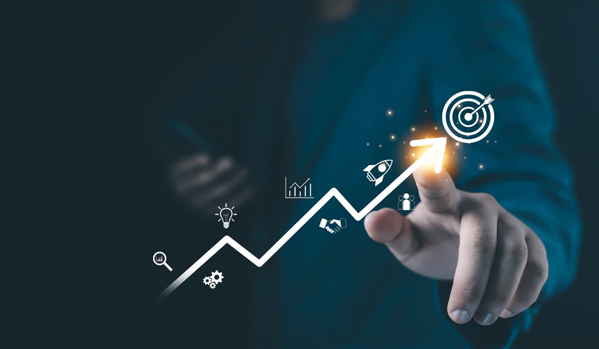 Businessman interacting with growth strategy and digital marketing icons